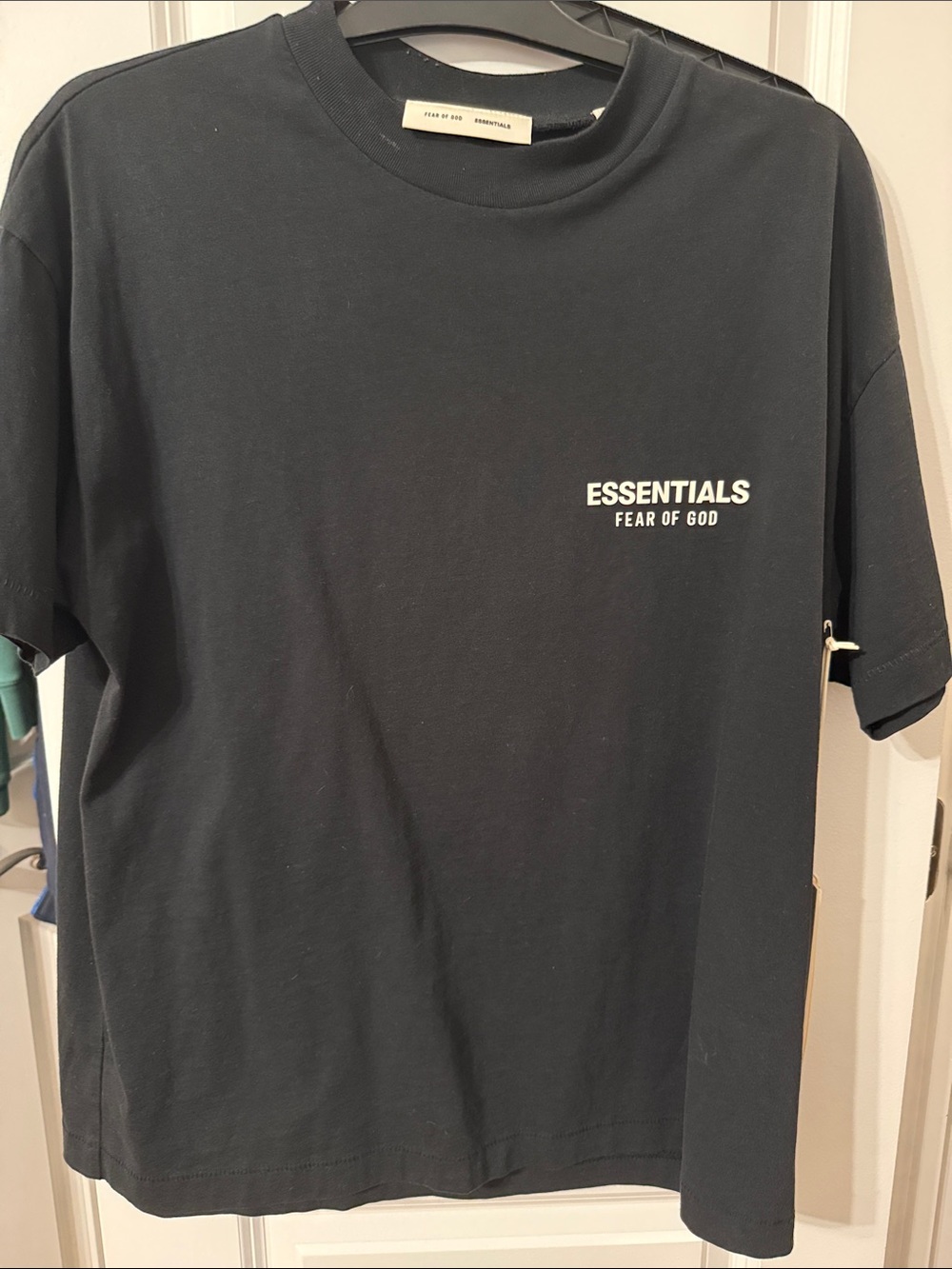 Fear of God Essentials Black Tee with White Neck Label